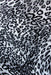 Detaliu model leopard pe un covor modern pentru living cu aspect decorativ si elegant.
